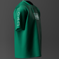 Green t-shirt with white logos on a dark gray background