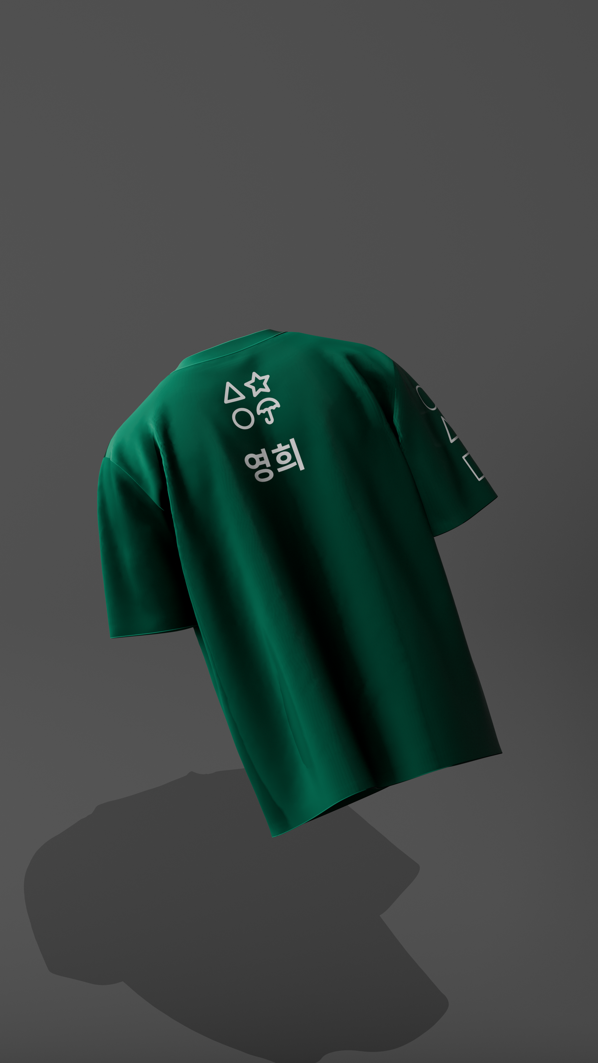 Green t-shirt with white text and symbols on a dark gray background