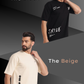 Two men wearing t-shirts with text, one black and one beige, on a gray background.