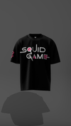 Black t-shirt with 'Squid Game' logo on a dark background