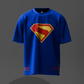 Blue t-shirt with Superman logo on a gray background