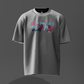 Gray t-shirt with colorful graphic design on a dark gray background
